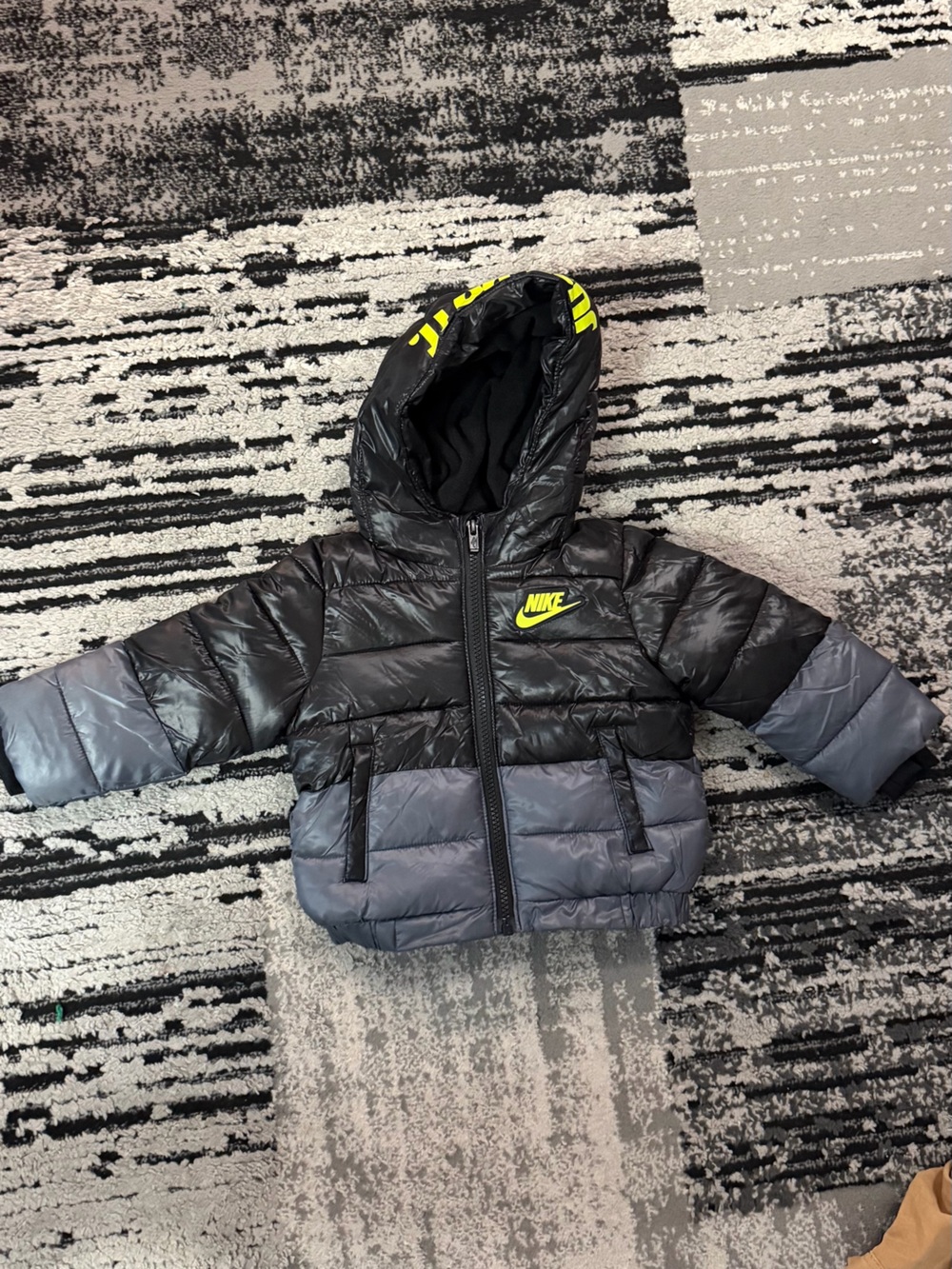 Nike Kids Black and Gray Puffer Jacket with Yellow Logo